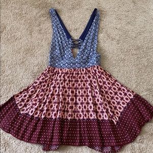 Adorable!! Plunging neckline, mini dress